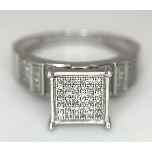 663 - A 9K WHITE GOLD FANCY DIAMOND RING 0.40CT 3G SIZE N 1/2. Ref: SC 6005