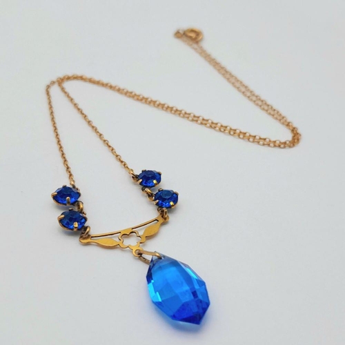 876 - A Vintage 9K Yellow Gold Blue Stone Lavaliere Necklace. 40cm length. 3.2g total weight.