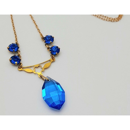 876 - A Vintage 9K Yellow Gold Blue Stone Lavaliere Necklace. 40cm length. 3.2g total weight.