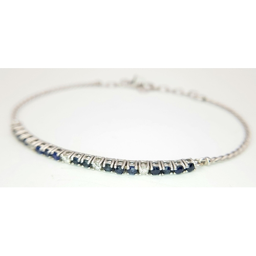 88 - AN 18K WHITE GOLD DIAMOND & SAPPHIRE BRACELET. 5.1G IN WEIGHT. APPROX. 17.5CM IN LENGTH. Ref: SC 610... 