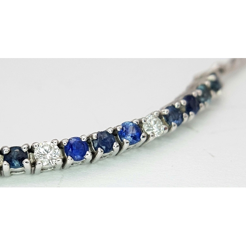 88 - AN 18K WHITE GOLD DIAMOND & SAPPHIRE BRACELET. 5.1G IN WEIGHT. APPROX. 17.5CM IN LENGTH. Ref: SC 610... 