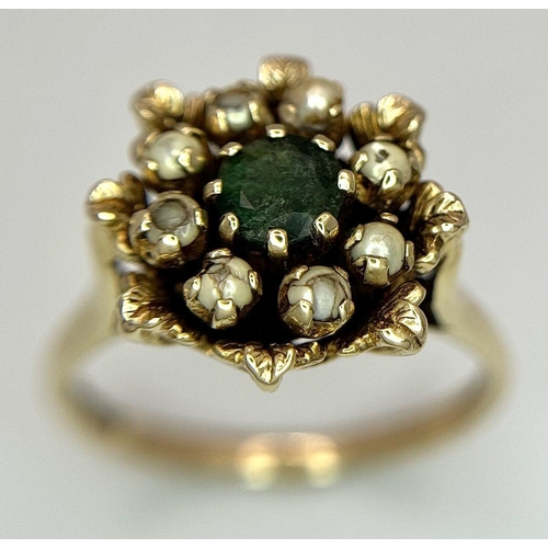 1386 - A 9K yellow gold emerald and pearl vintage flower ring, 0.48ct diamond weight, 4.7g total weight, si... 