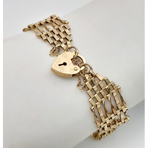 1371 - A 9K yellow gold gate bracelet, 6.6g total weight, 18cm total length. Ref SH1719I