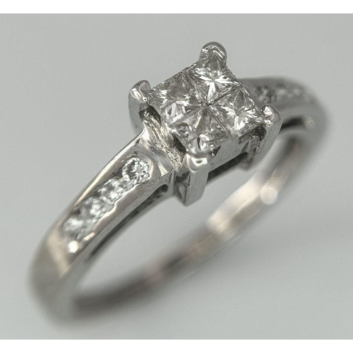 1336 - A 18K White Gold Diamond Square Cluster Ring, 0.35ct diamond weight, 2.5g total weight, size J 1/2. ... 