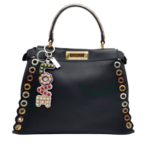 568 - A Fendi Peekaboo Bag. Black leather exterior with multi-colour eyelets and 'Love' fob. Gold tone har... 