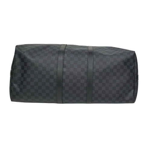 645 - A Louis Vuitton Blue and Black Damier Keepall 55 Bag. Blue and black Damier canvas exterior with bla... 