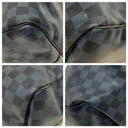 645 - A Louis Vuitton Blue and Black Damier Keepall 55 Bag. Blue and black Damier canvas exterior with bla... 