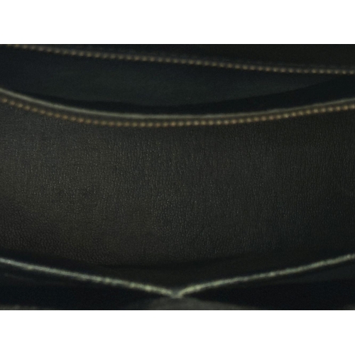 652 - RETURN TO MARIA - DO NOT SELL

An Hermès Box Kelly Sellier 32 Handbag. Black smooth calfskin leather... 