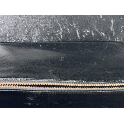 652 - RETURN TO MARIA - DO NOT SELL

An Hermès Box Kelly Sellier 32 Handbag. Black smooth calfskin leather... 