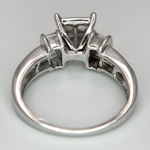 131 - A 14K WHITE GOLD DIAMOND RING, BAGUETTE AND SQUARE CUT DIAMOND. 1.10CT 4G SIZE L. Ref: SC 6062