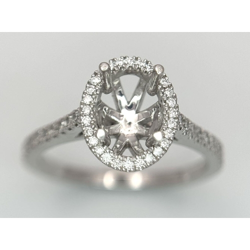 180 - A PLATINUM DIAMOND HALO RING WITH DIAMOND SHOULDERS RING MOUNT READY TO SET YOUR DREAM STONE IN HOLD... 