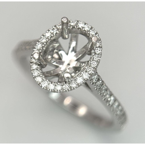 180 - A PLATINUM DIAMOND HALO RING WITH DIAMOND SHOULDERS RING MOUNT READY TO SET YOUR DREAM STONE IN HOLD... 