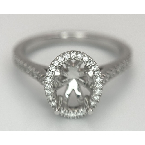 180 - A PLATINUM DIAMOND HALO RING WITH DIAMOND SHOULDERS RING MOUNT READY TO SET YOUR DREAM STONE IN HOLD... 