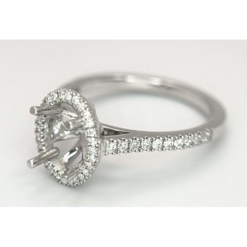 180 - A PLATINUM DIAMOND HALO RING WITH DIAMOND SHOULDERS RING MOUNT READY TO SET YOUR DREAM STONE IN HOLD... 