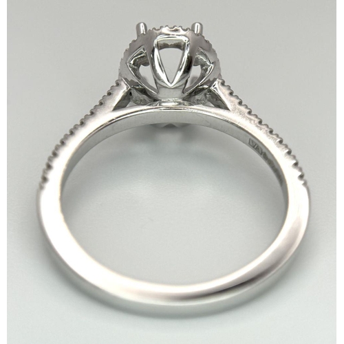 180 - A PLATINUM DIAMOND HALO RING WITH DIAMOND SHOULDERS RING MOUNT READY TO SET YOUR DREAM STONE IN HOLD... 