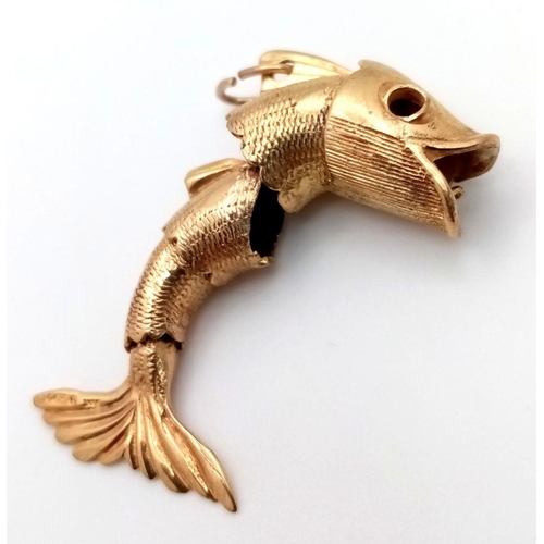 211 - A 9K Yellow Gold Articulated Leaping Fish Pendant! 4cm. 6.22g weight.