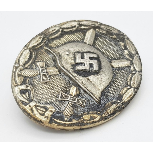 216 - A WW2 German LDO Made Silver Grade Wound Badge for being wounded three or four times, loss of limbs,... 