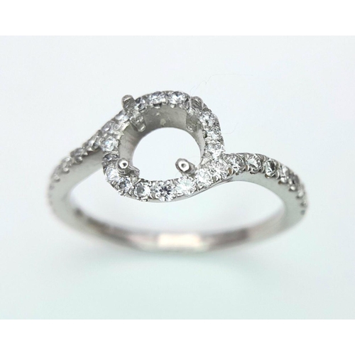 250 - A PLATINUM DIAMOND TWIST RING MOUNT READY TO SET YOUR DREAM STONE IN HOLDS A 0.70CT ROUND BRILIANT S... 