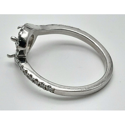 250 - A PLATINUM DIAMOND TWIST RING MOUNT READY TO SET YOUR DREAM STONE IN HOLDS A 0.70CT ROUND BRILIANT S... 