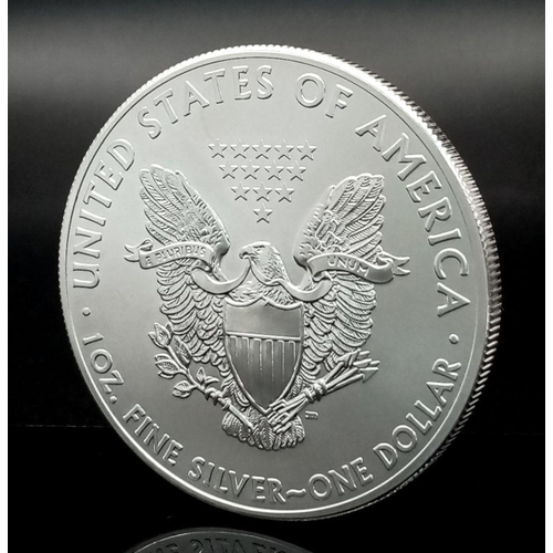 302 - A Fine Silver (.999) 2014 USA One Dollar Coin - 1oz, Mint Condition.