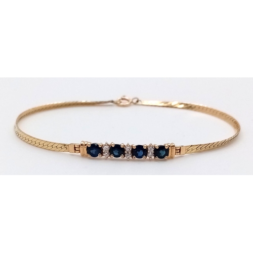 323 - A 14k Yellow Gold Sapphire and Diamond Bracelet. Four round cut sapphires with diamond spacers. 16cm... 