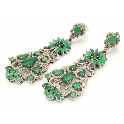 401 - A pair 925 silver Emerald and Diamond Dangler Earrings. 12.1cts of emeralds and 2.65cts of diamonds.... 