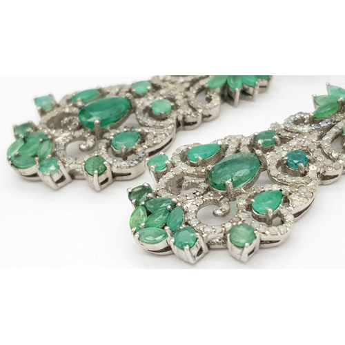 401 - A pair 925 silver Emerald and Diamond Dangler Earrings. 12.1cts of emeralds and 2.65cts of diamonds.... 