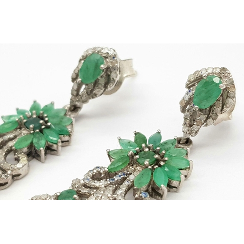 401 - A pair 925 silver Emerald and Diamond Dangler Earrings. 12.1cts of emeralds and 2.65cts of diamonds.... 