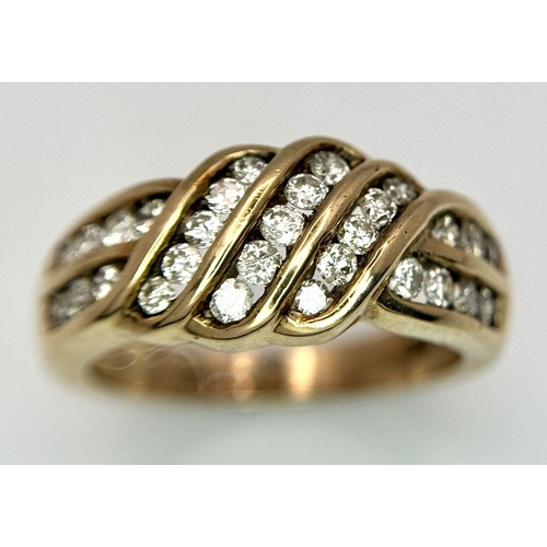 411 - A 9K YELLOW GOLD DIAMOND SET FANCY RING. 0.65CT. 5.6G IN WEIGHT. SIZE N. Ref: SC 6049