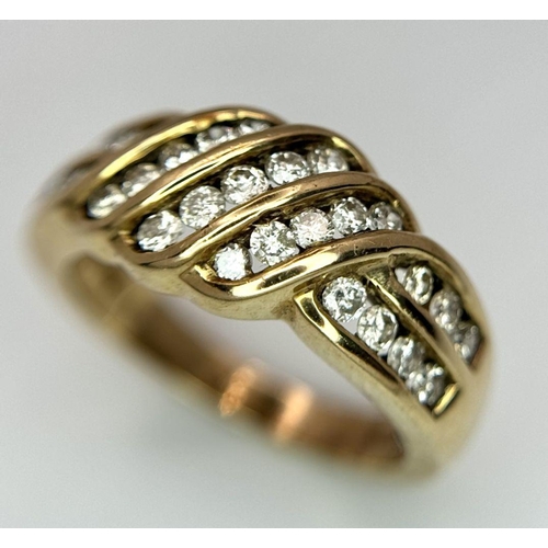 411 - A 9K YELLOW GOLD DIAMOND SET FANCY RING. 0.65CT. 5.6G IN WEIGHT. SIZE N. Ref: SC 6049