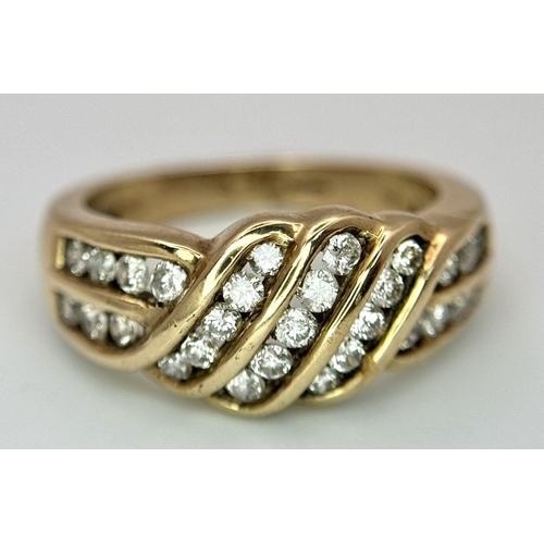 411 - A 9K YELLOW GOLD DIAMOND SET FANCY RING. 0.65CT. 5.6G IN WEIGHT. SIZE N. Ref: SC 6049