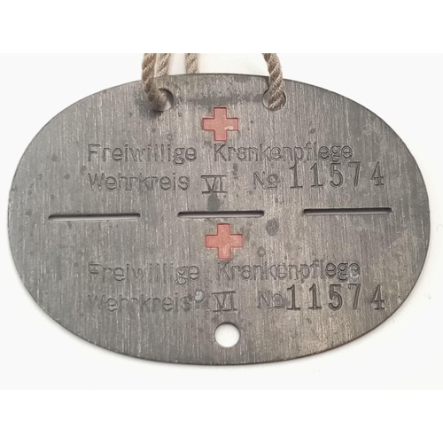 426 - A 3rd Reich DRK (German Red Cross) Nurses Dog Tag.