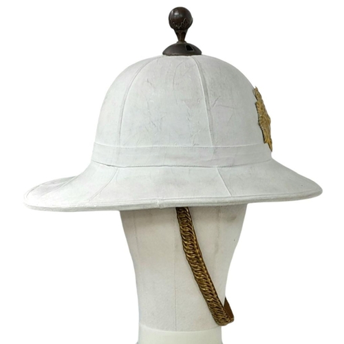 474 - A Royal Marines Band Pith Helmet complete with Queens Crown Helmet Plate and Globe Top Piece.