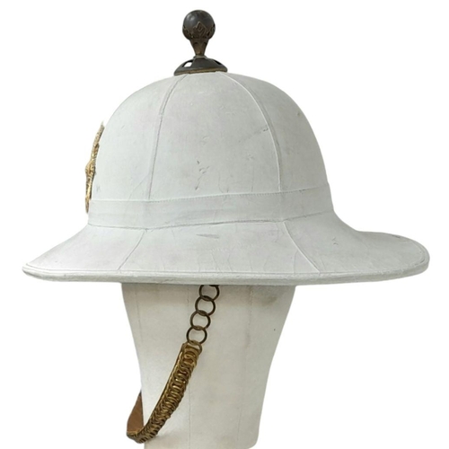 474 - A Royal Marines Band Pith Helmet complete with Queens Crown Helmet Plate and Globe Top Piece.