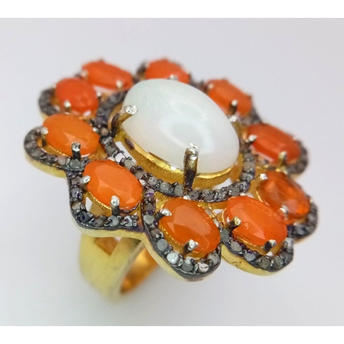 506 - A 925 Silver White and Orange Opal Ring, featuring a central white opal surrounded by vibrant orange... 