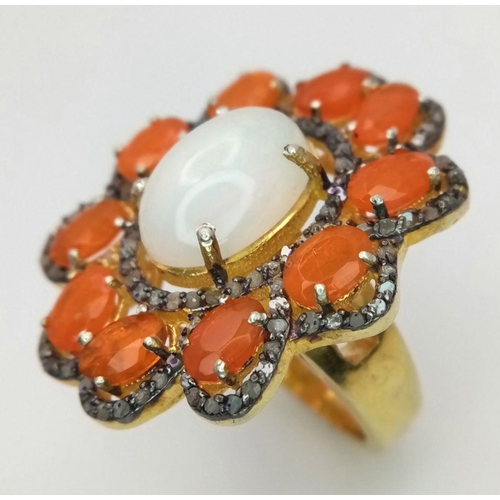 506 - A 925 Silver White and Orange Opal Ring, featuring a central white opal surrounded by vibrant orange... 