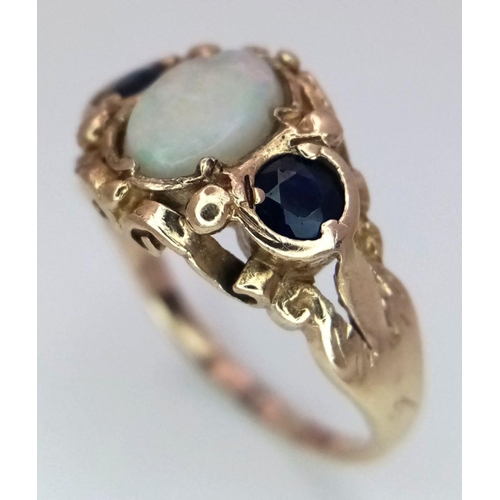 516 - A 9K YELLOW GOLD SAPPHIRE & OPAL RING. 2.7G IN WEIGHT. SIZE J. Ref: 8404.