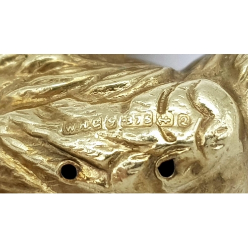 533 - A 9K Yellow Gold Cock. This cock can be hung from a necklace or dangled from a bracelet. 25mm. 1.7g ... 