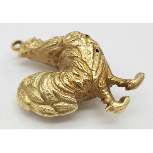 533 - A 9K Yellow Gold Cock. This cock can be hung from a necklace or dangled from a bracelet. 25mm. 1.7g ... 