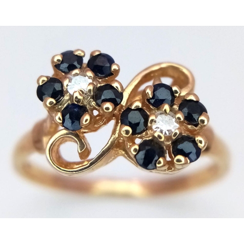 558 - A 9K YELLOW GOLD DIAMOND & SAPPHIRE DOUBLE CLUSTER RING. 2.8G IN WEIGHT. SIZE Q. Ref: SC 6035