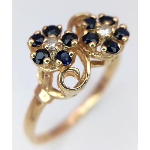 558 - A 9K YELLOW GOLD DIAMOND & SAPPHIRE DOUBLE CLUSTER RING. 2.8G IN WEIGHT. SIZE Q. Ref: SC 6035