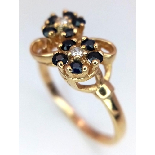 558 - A 9K YELLOW GOLD DIAMOND & SAPPHIRE DOUBLE CLUSTER RING. 2.8G IN WEIGHT. SIZE Q. Ref: SC 6035