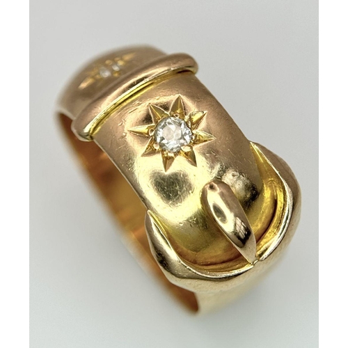 60 - AN 18K YELLOW GOLD DIAMOND SET BUCKLE RING. 7.1G IN WEIGHT. SIZE N. Ref: SC 6095