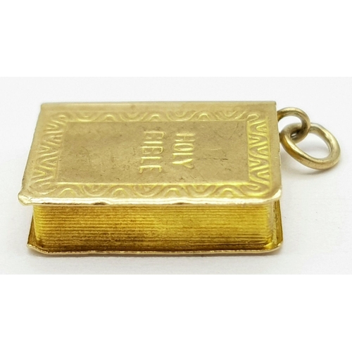 625 - A 9K Yellow Gold Holy Bible Pendant/Charm. 15mm. 1.35g weight.