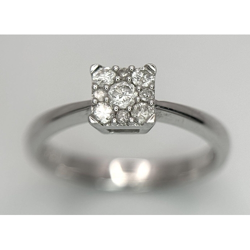 649 - A 9K WHITE GOLD DIAMOND RING 0.15CT 1.9G SIZE H 1/2. Ref: SC 6002