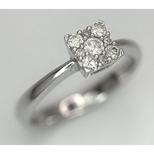 649 - A 9K WHITE GOLD DIAMOND RING 0.15CT 1.9G SIZE H 1/2. Ref: SC 6002