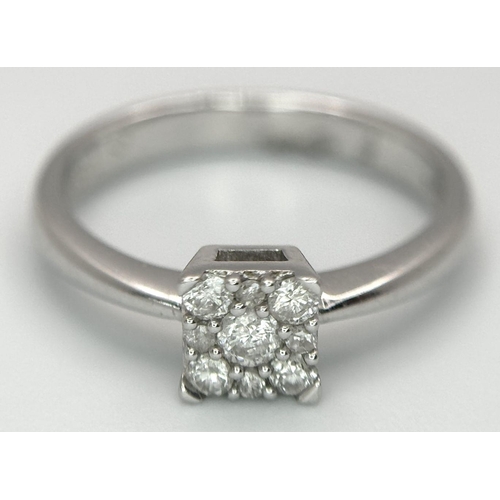 649 - A 9K WHITE GOLD DIAMOND RING 0.15CT 1.9G SIZE H 1/2. Ref: SC 6002