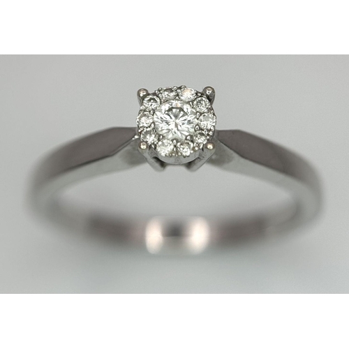 691 - A 9K WHITE GOLD DIAMOND RING 0.15CT 2.2G SIZE M. Ref: SC 6017