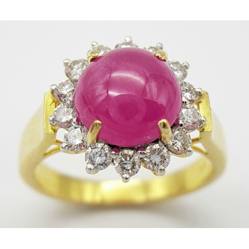 95 - AN 18K YELLOW GOLD DIAMOND & CABACHON RUBY CLUSTER RING. 5.6G IN WEIGHT. SIZE M AND 1/2. Ref: 8841