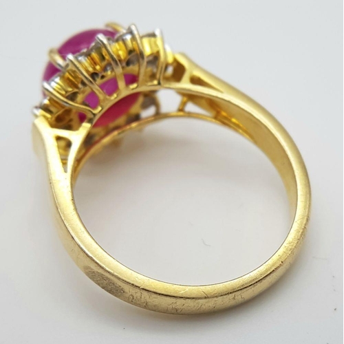 95 - AN 18K YELLOW GOLD DIAMOND & CABACHON RUBY CLUSTER RING. 5.6G IN WEIGHT. SIZE M AND 1/2. Ref: 8841